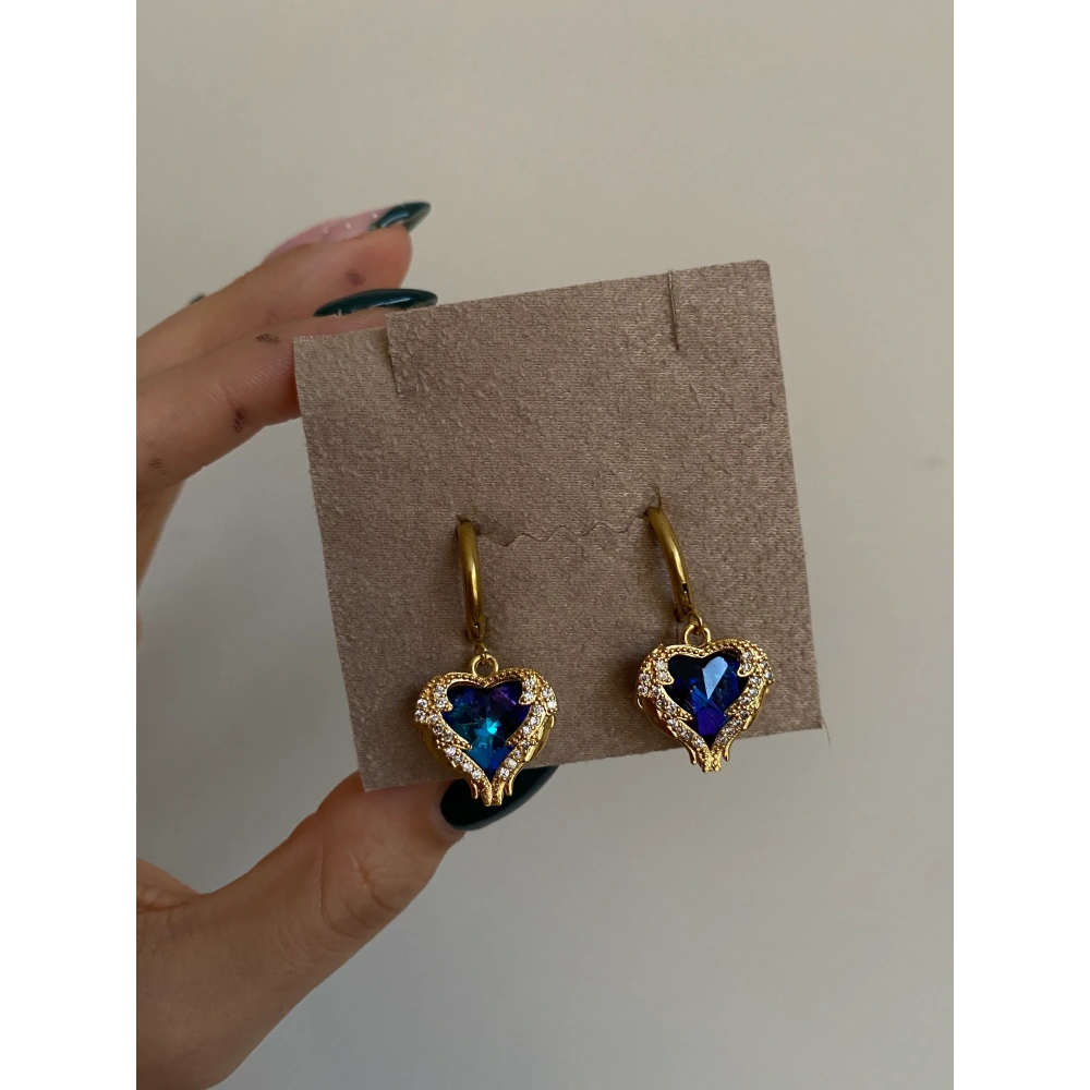 Çelik Lila Melek Kanatlı Küpe