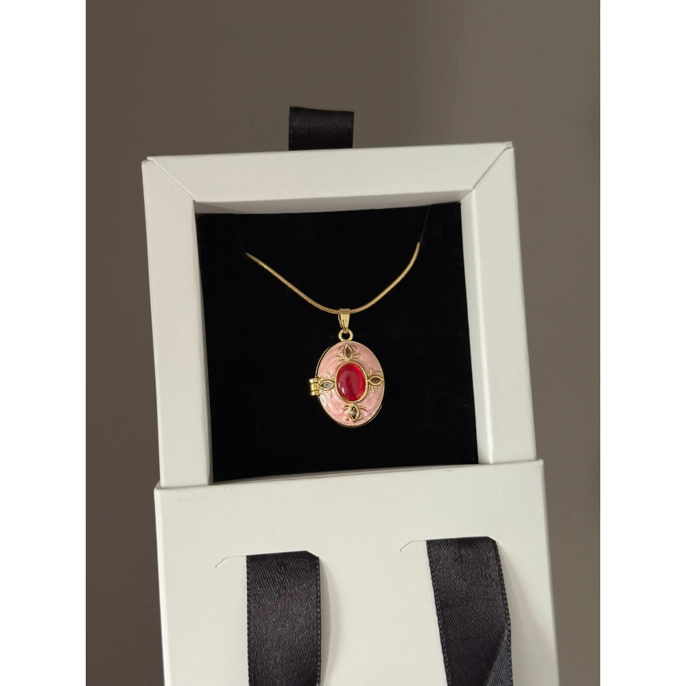 Çelik Pembe Kapaklı Kolye