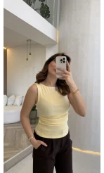 Dilvin Sıfır Kol Beli Büzgü Detaylı Kayık Yaka Body - Sarı - Kod: 31589