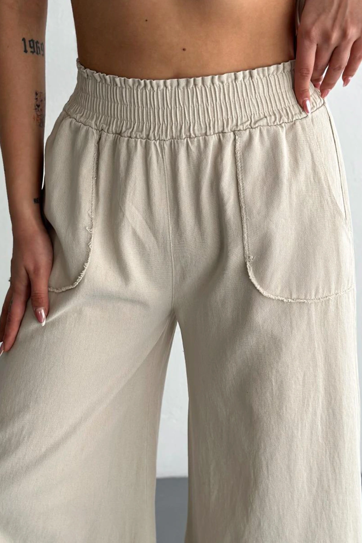 Kadın Bel Lastikli Cepli Bol Paça Koton Bej Pantolon