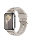 Apple Watch 44mm Zore KRD-117 Hava Alabilen Delikli Metal Süslemeli Desenli Silikon Kordon
