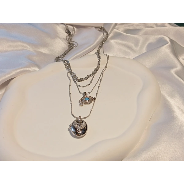 Çelik Katmanlı Zincir Detaylı Zirkon Taşlı Göz ve Oval Madalyon Kombin Kolye