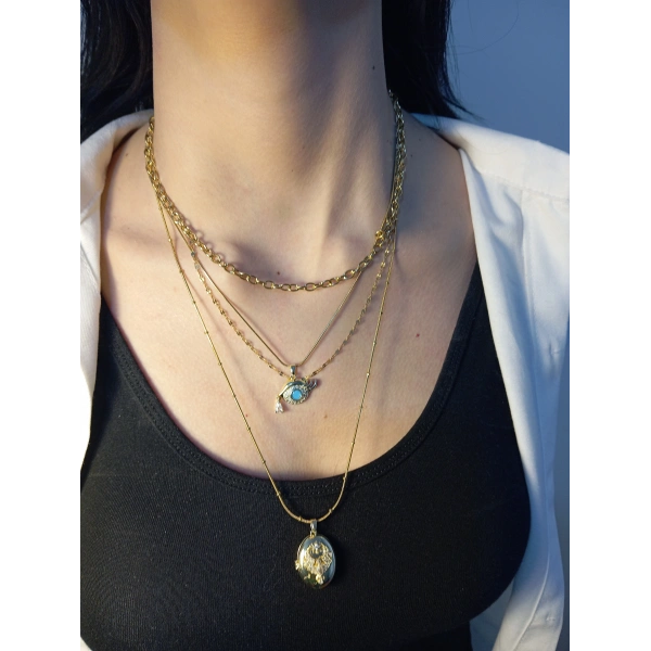 Gold Renk Mistik Işıltı ve Modern Tasarım: Çelik Katmanlı Göz ve Oval Madalyon Kolye