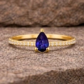 0.32 Carat Pear Cut Sapphire Diamond Ring