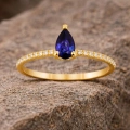 0.32 Carat Pear Cut Sapphire Diamond Ring