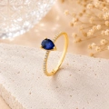 0.32 Carat Pear Cut Sapphire Diamond Ring