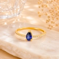 0.32 Carat Pear Cut Sapphire Diamond Ring
