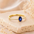 0.32 Carat Pear Cut Sapphire Diamond Ring