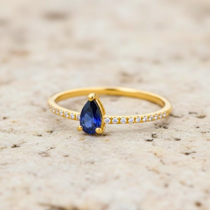 0.32 Carat Pear Cut Sapphire Diamond Ring