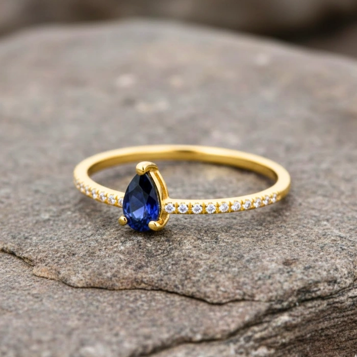 0.32 Carat Pear Cut Sapphire Diamond Ring