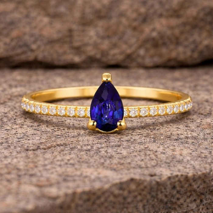 0.32 Carat Pear Cut Sapphire Diamond Ring