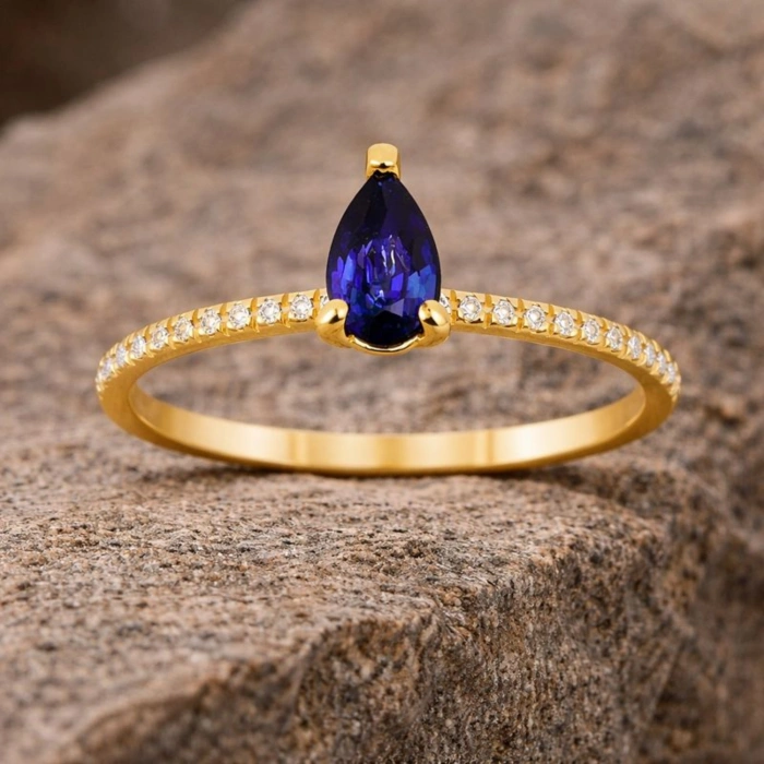 0.32 Carat Pear Cut Sapphire Diamond Ring