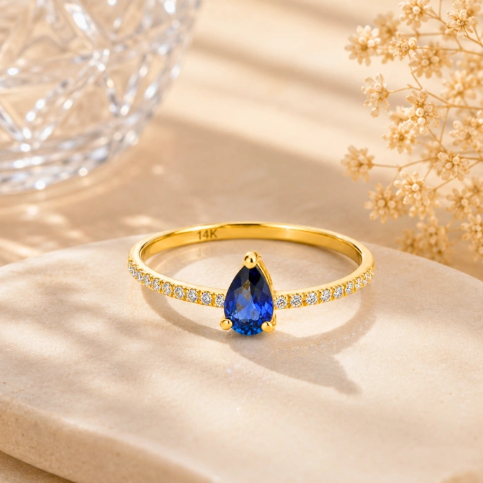 0.32 Carat Pear Cut Sapphire Diamond Ring