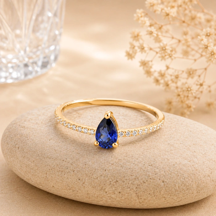 0.32 Carat Pear Cut Sapphire Diamond Ring
