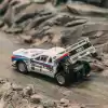 Tarmac Works 1/64 Lancia 037 Rally Rally Monte Carlo 1983 #1 with Tarmac Cards - HOBBY64+ T64P-TL002-83RMC01