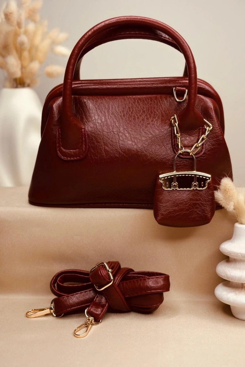 BOWLER BORDO DERİ EL ÇANTASI