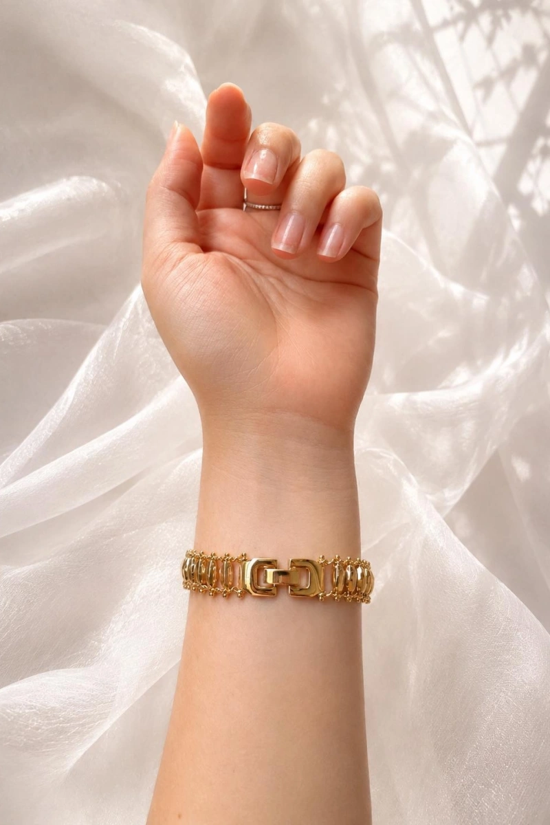DÖNEN SİLİNDİR DETAYLI GOLD BİLEKLİK