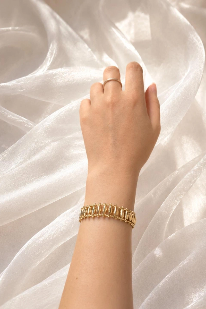DÖNEN SİLİNDİR DETAYLI GOLD BİLEKLİK
