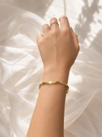 ÇİZGİLİ DOKULU GOLD BİLEKLİK