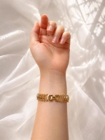 DÖNEN SİLİNDİR DETAYLI GOLD BİLEKLİK
