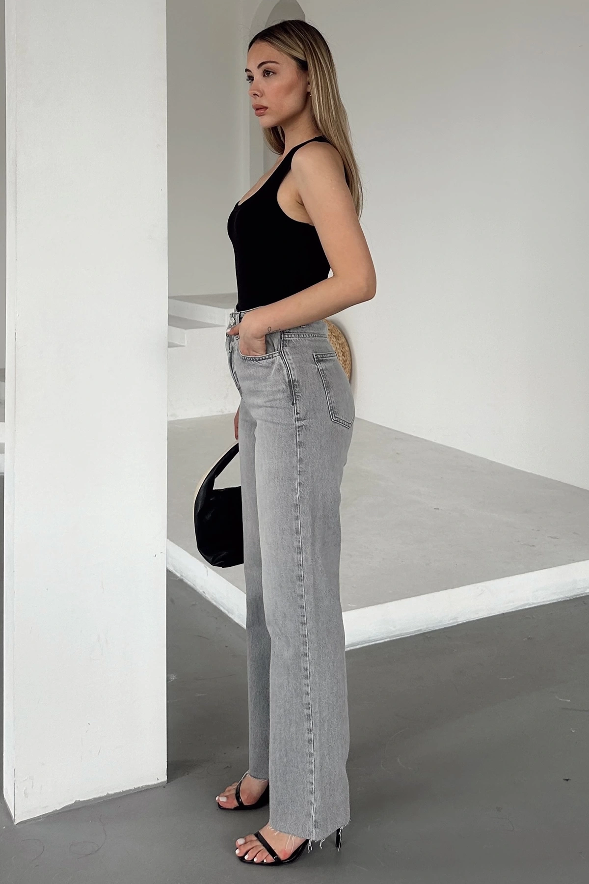 Yüksel Bel Kesik Geniş Paça Jean