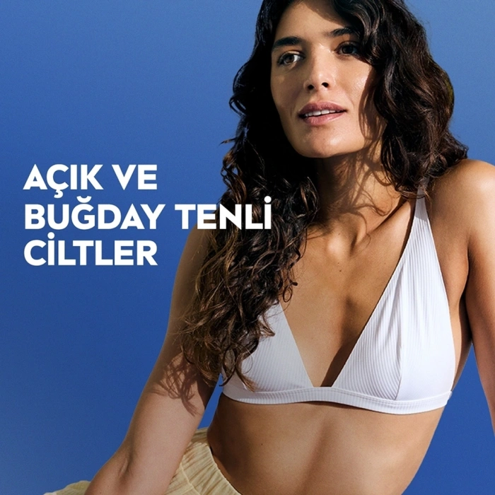 Nivea Q10 Sıkılaştırıcı Bronzlaştırıcı Vücut Losyonu 400 ml