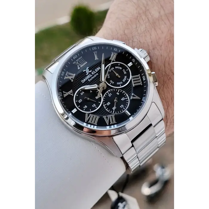 Daniel Klein DKISTE1528 Kadranı Siyah Kordonu Gümüş Renk 45 mm Erkek Kol Saati