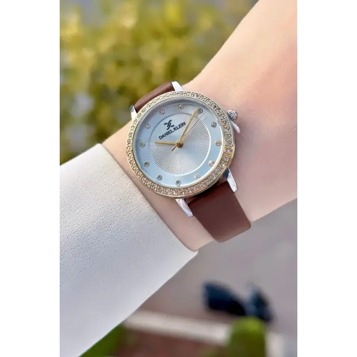 Daniel Klein DKISTE1932 Yeni Model Gold Gümüş Renk Kadın Kol Saati ve Kahverengi Renk Deri Kordon