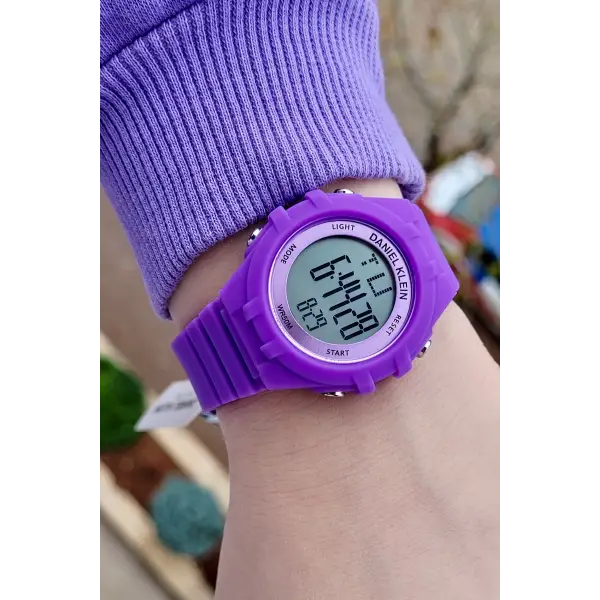 Daniel Klein DKISTE939 Mor Renk 7 Farklı Işıklı, Alarmlı, Kronometreli Kız Çocuk Kol Saati (5-12 Yaş)