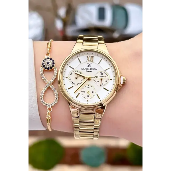 Daniel Klein DK1ISTE923 Gold Renk Fonksiyonlu Kadın Kol Saati ve Bileklik