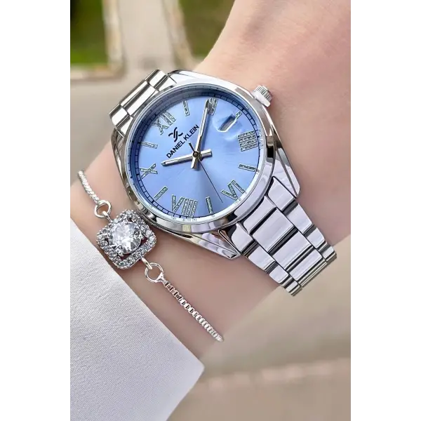 Daniel Klein DKISTE970 Kadranı Mavi Kordonu Gümüş Renk Takvimli Kadın Kol Saati ve Bileklik