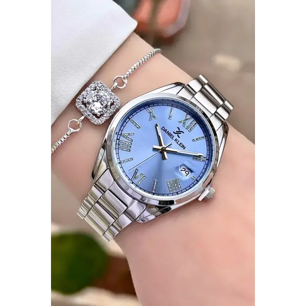 Daniel Klein DKISTE970 Kadranı Mavi Kordonu Gümüş Renk Takvimli Kadın Kol Saati ve Bileklik