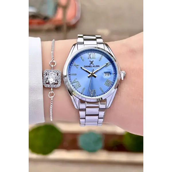 Daniel Klein DKISTE970 Kadranı Mavi Kordonu Gümüş Renk Takvimli Kadın Kol Saati ve Bileklik