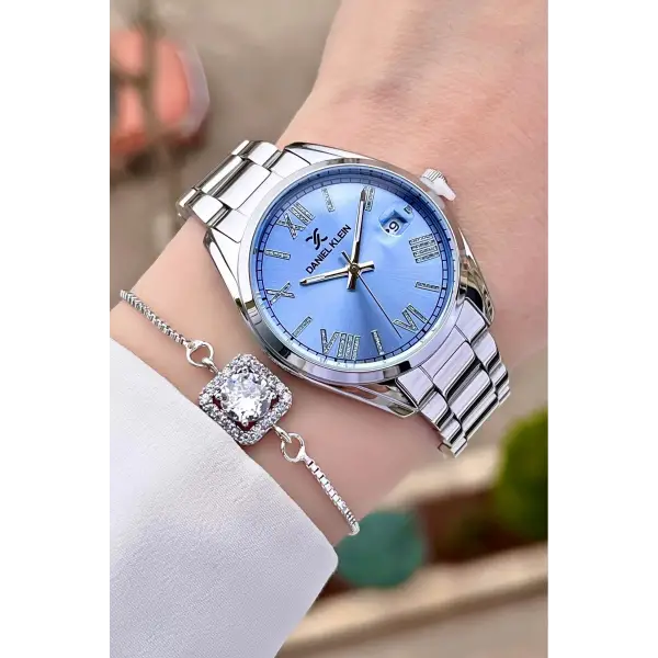 Daniel Klein DKISTE970 Kadranı Mavi Kordonu Gümüş Renk Takvimli Kadın Kol Saati ve Bileklik