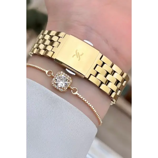 Daniel Klein DKISTE1029 Gold Renk Hediye Paketli Kadın Kol Saati ve Bileklik