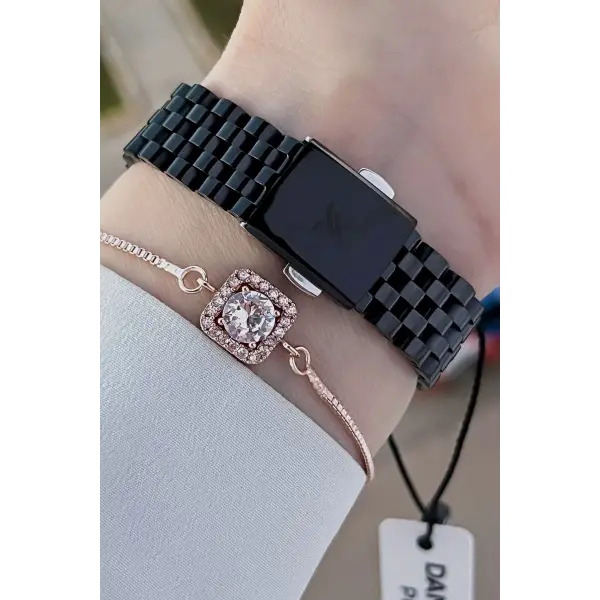 Daniel Klein DKISTE1016 Rose Siyah Renk Hediye Paketli Kadın Kol Saati ve Bileklik