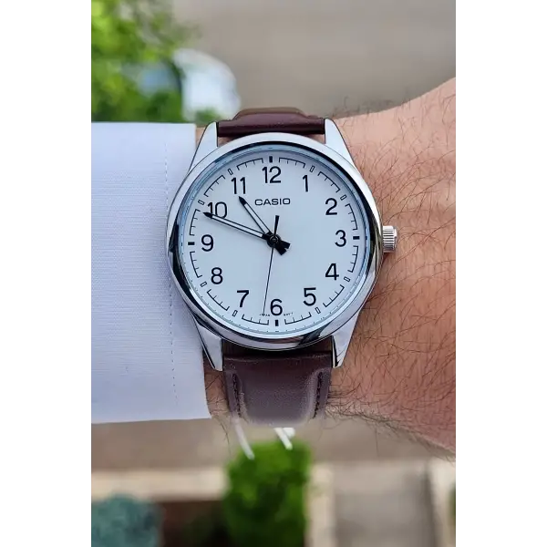 Casio CSISTE13 Kasası Gümüş Kordonu Kahverengi Renk Hediye Paketli Erkek Kol Saati