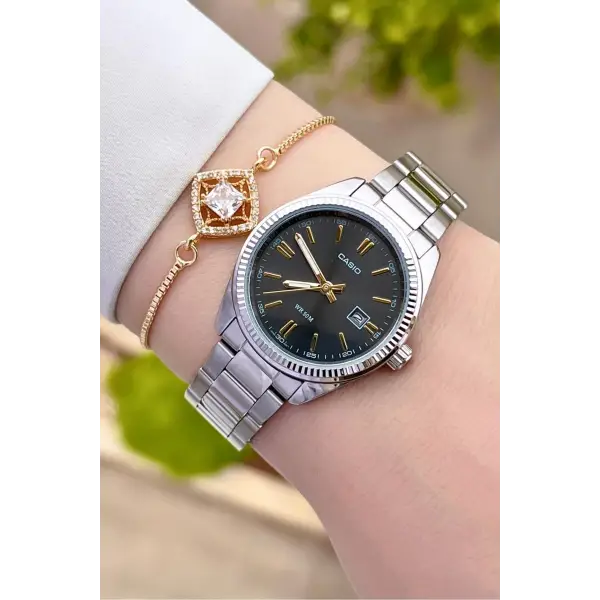 Casio CSISTE16 Kadranı Füme Kordonu Gümüş Renk Hediye Paketli Kadın Kol Saati