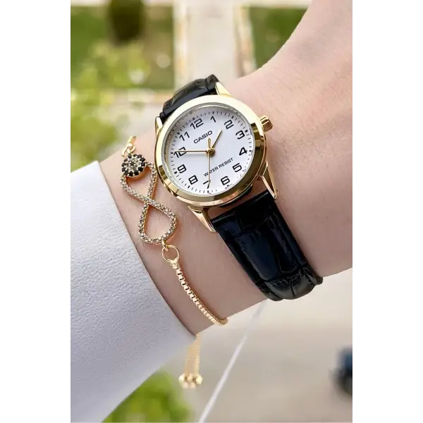 Casio CSISTE20 Kasası Gold Kordonu Siyah Renk Hediye Paketli Kadın Kol Saati