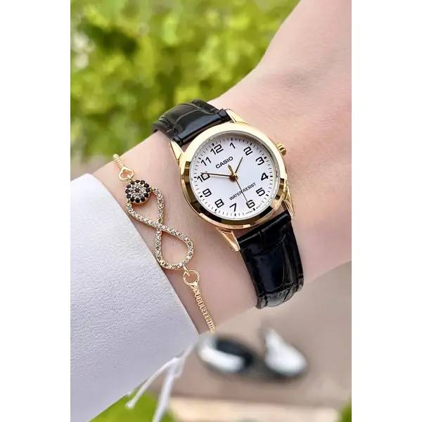 Casio CSISTE20 Kasası Gold Kordonu Siyah Renk Hediye Paketli Kadın Kol Saati