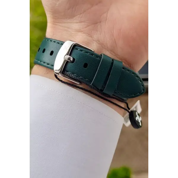 Daniel Klein DKISTE1175 Kasası Gümüş Kordonu ve Kadranı Yeşil Renk Hediye Paketli Takvimli Erkek Kol Saati