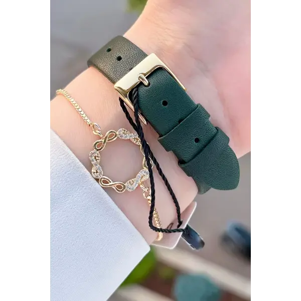 Daniel Klein DKISTE1203 Kasası Gold Kordonu Yeşil Renk Hediye Paketli Kadın Kol Saati ve Bileklik