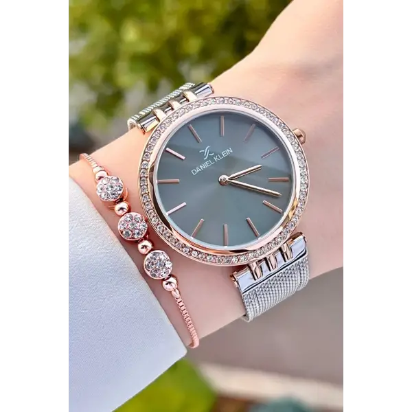 Daniel Klein DKISTE1223 Kasası Rose Kordonu Gümüş Renk Hediye Paketli Kadın Kol Saati ve Bileklik