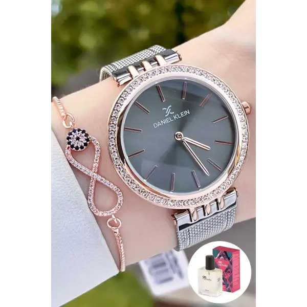 Daniel Klein DK1ISTE1223 Kasası Rose Kordonu Gümüş Renk Kadın Kol Saati Bileklik ve Parfüm Hediyeli