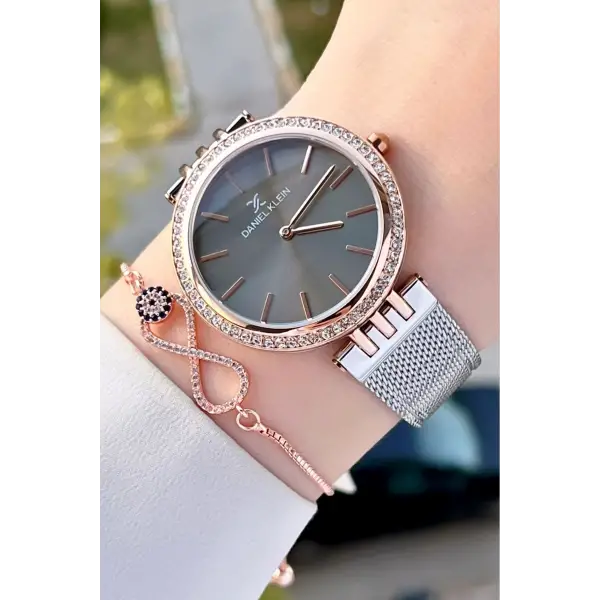 Daniel Klein DK1ISTE1223 Kasası Rose Kordonu Gümüş Renk Kadın Kol Saati Bileklik ve Parfüm Hediyeli