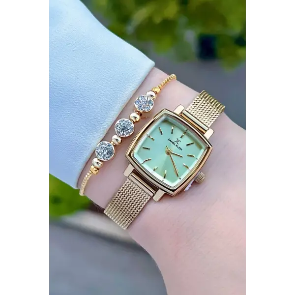 Daniel Klein DKISTE1222 Kadranı Sarı Kordonu Gold Renk Hediye Paketli Kadın Kol Saati ve Bileklik
