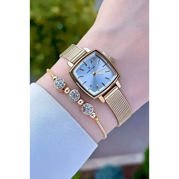 Daniel Klein DKISTE1220 Kadranı Gümüş Kordonu Gold Renk Hediye Paketli Kadın Kol Saati ve Bileklik