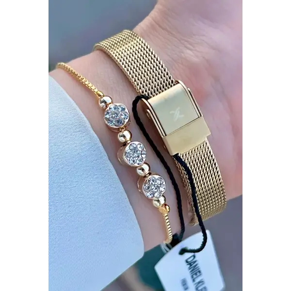 Daniel Klein DKISTE1220 Kadranı Gümüş Kordonu Gold Renk Hediye Paketli Kadın Kol Saati ve Bileklik