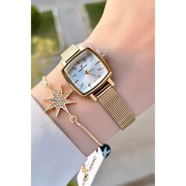 Daniel Klein DKISTE1220 Kadranı Gümüş Kordonu Gold Renk Hediye Paketli Kadın Kol Saati ve Bileklik