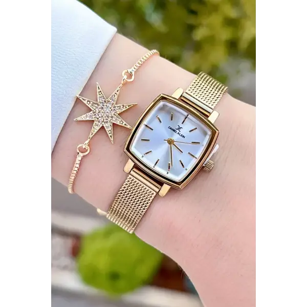 Daniel Klein DKISTE1220 Kadranı Gümüş Kordonu Gold Renk Hediye Paketli Kadın Kol Saati ve Bileklik